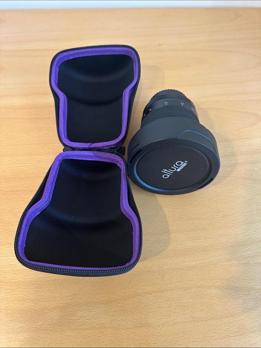 Black Camera Lens with Purple-Trim Protective Case